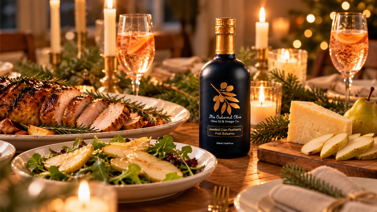 Festive holiday table with Jeweled Cran-Pearberry Fruit Balsamic, salad, cheese board and roast pork